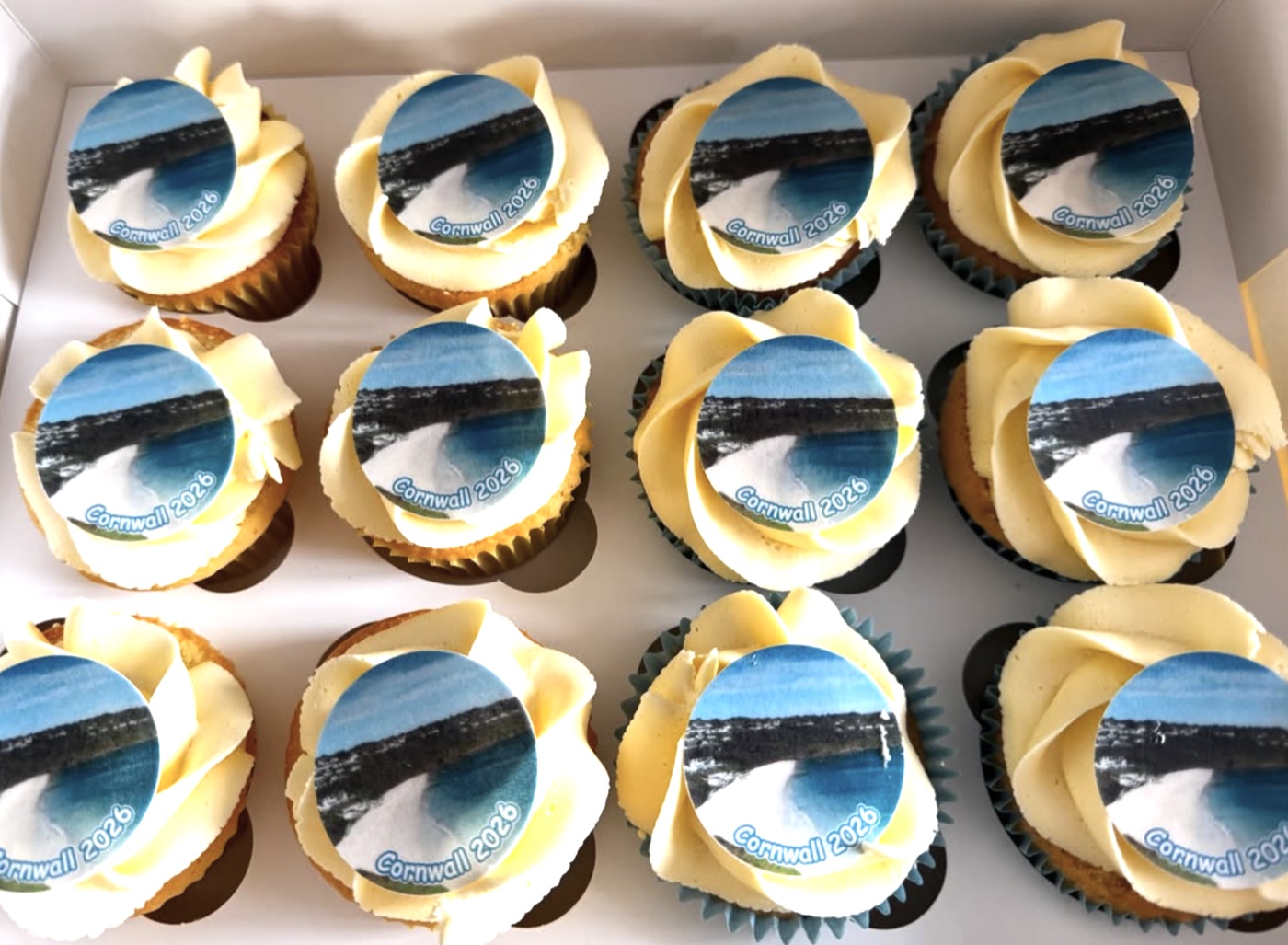 Cupcakes with personalised Cornwall photo toppers